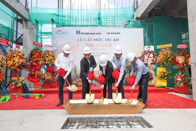 The Marq celebrating its topping-out ceremony